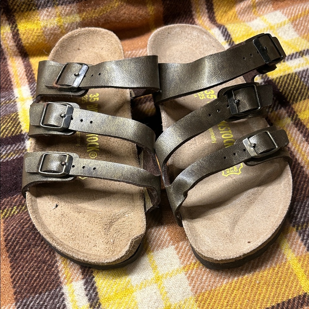 Birkenstock Florida Bronze Triple-Strap Sandals kink from storage